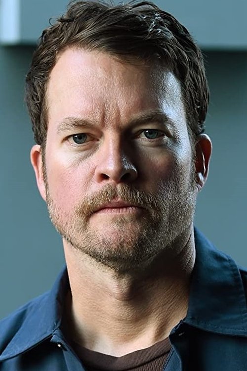 John Churchill as Murdoch