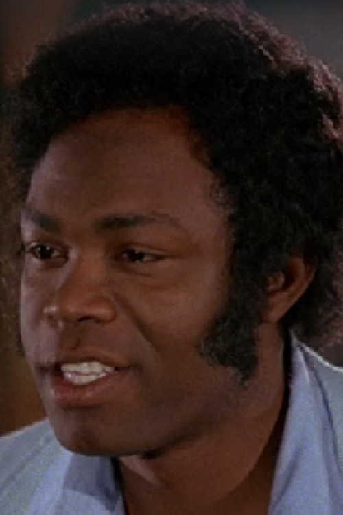 Dino Washington as Willie Green Henchman (Blue Suit)