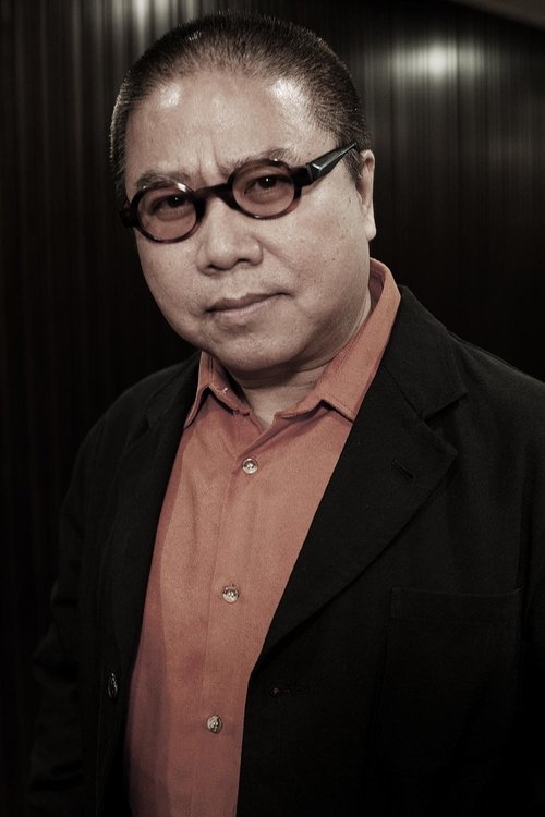 Fruit Chan as Travel Agency's Staff