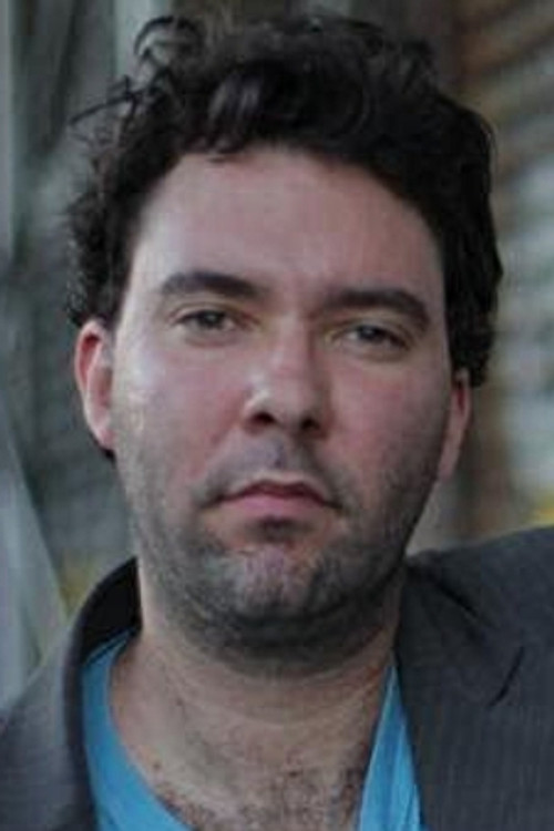 Aaron Cassara as Tom