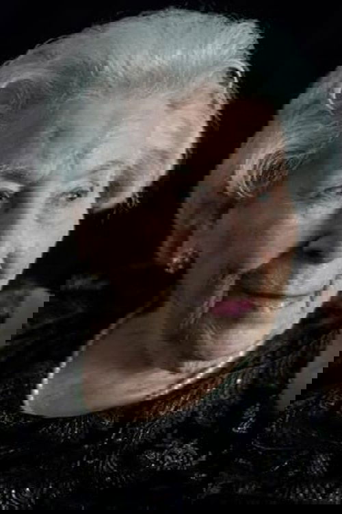 Jeannette Charles as The Queen