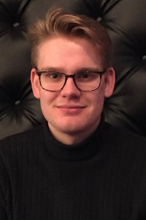 Shashi Baltutis as The Barman