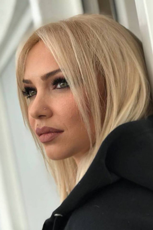 Xhemi Shehu as Herself - Moderator