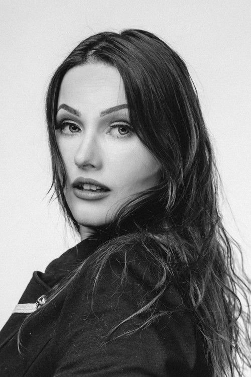 Katie Madonna Lee as Maura