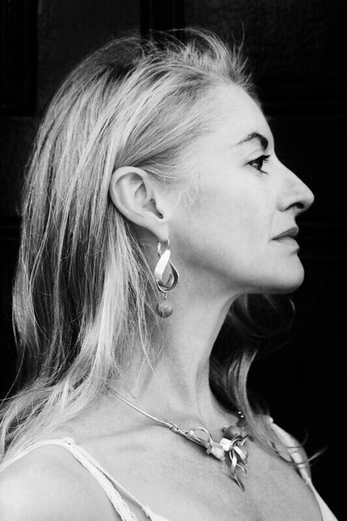 Elizabeth McGorian as The Queen