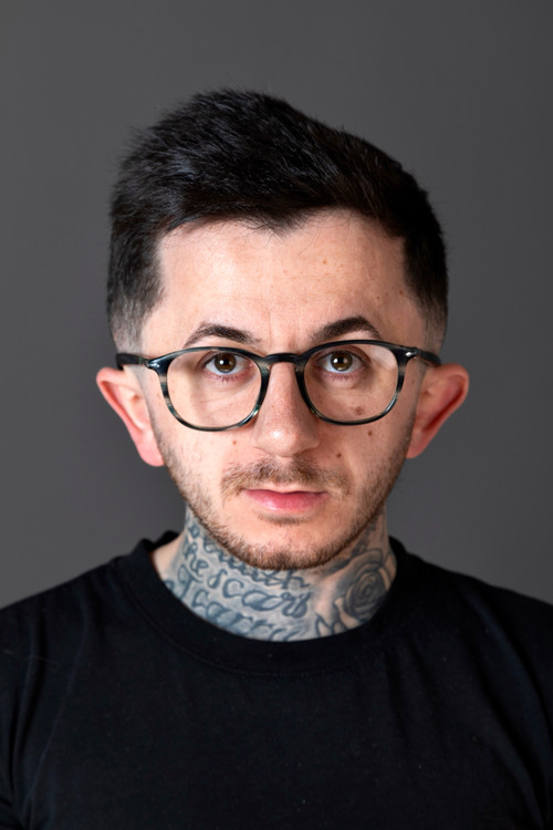 Robert Brodie as Background rave extra