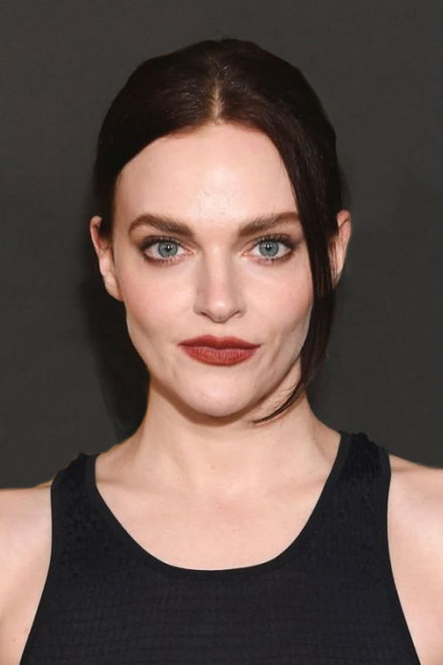 Madeline Brewer as Louise Flannery
