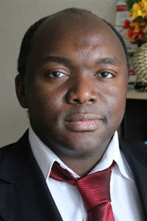 Alain Dzukam Simo as Rokko