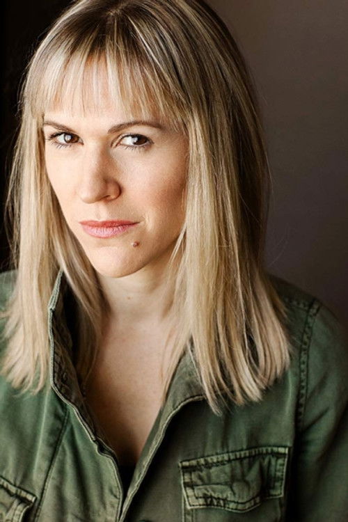 Adrianne Richards as La vraie Janet