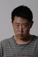 Qing Li as Cameraman