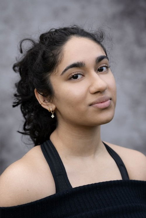 Zara Redford as Kate