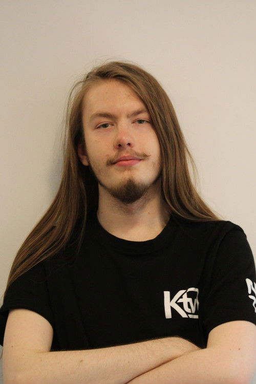 Sam Churchward as Carl