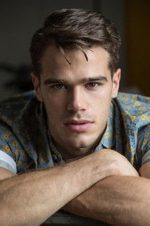 Tucker Des Lauriers as Justin