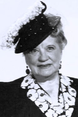 May Beatty as Mrs. Lucy Sanderson