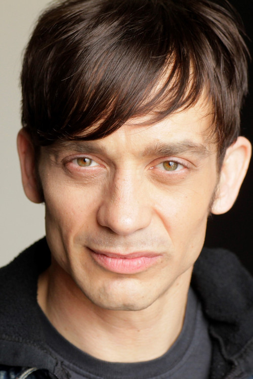 Danny Belrose as Gas Station Attendant