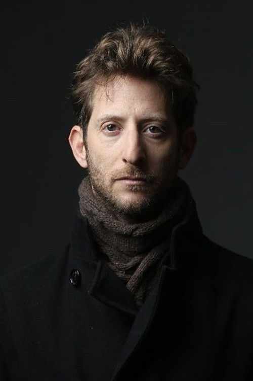 Pini Tavger as Alex Kaplan