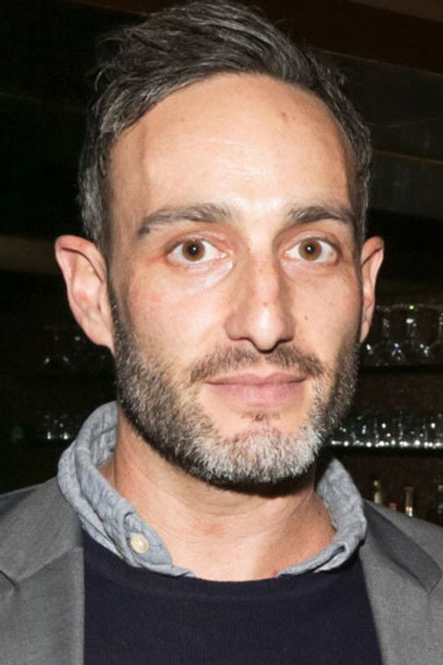 Murray Miller as Photographer