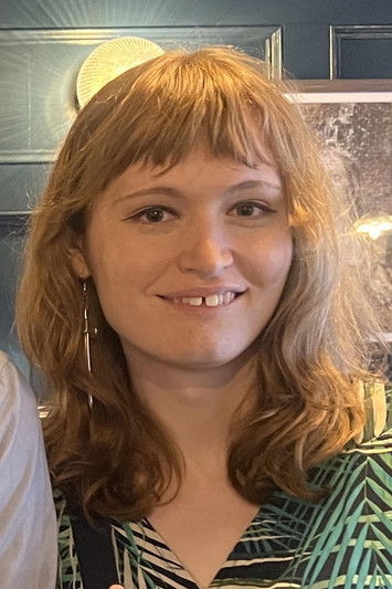 Lily Paris as The Hand