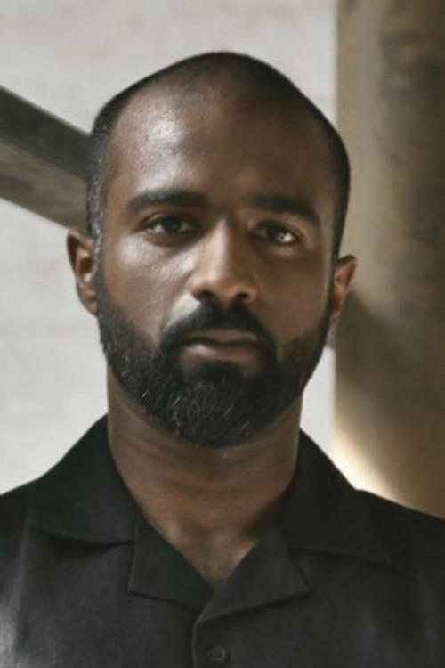 Noble Luke as DJ Neel