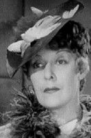 Mira McKinney as Minister's Wife