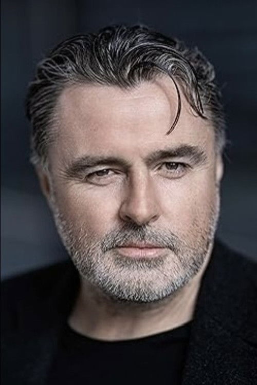 Johnny Elliott as The Head