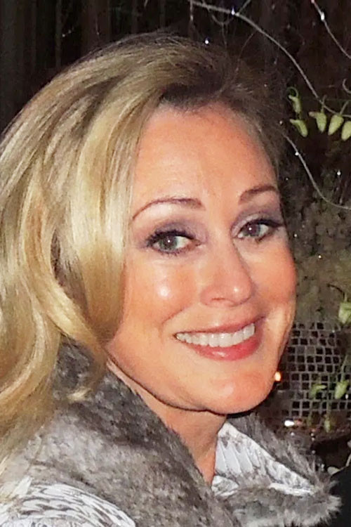 Sandra Wilder as Blonde Photographer