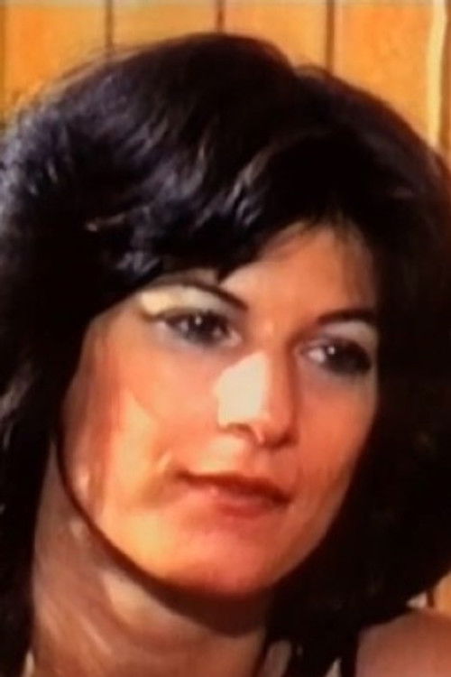 T.J. Carson as Orgy Girl in Red Chair