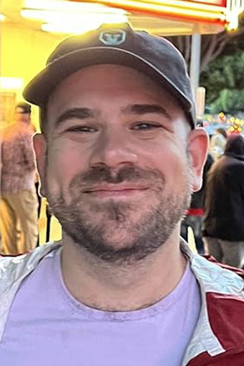 David Ridker as Researcher