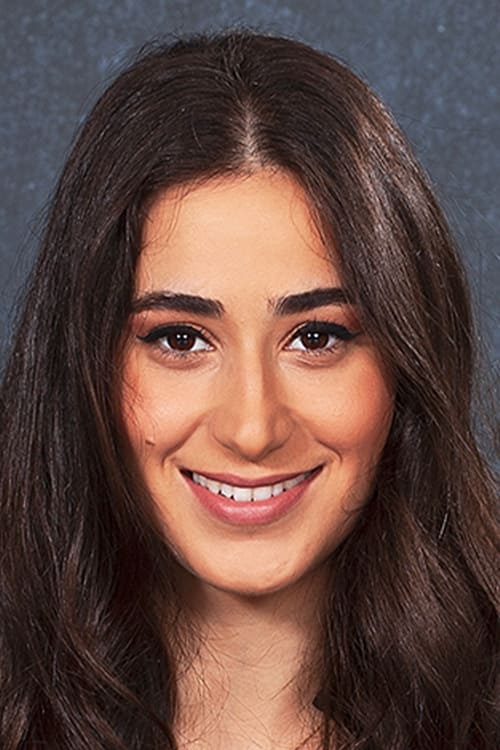 Maria Zreik as Munira