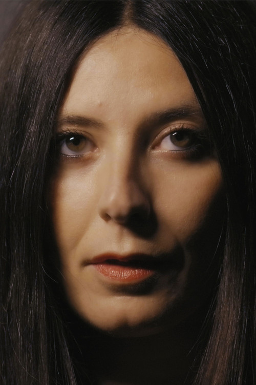 Alessia Rubini as Carole Simmons