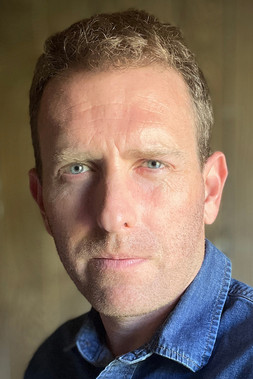 Travis Mills as Dolan