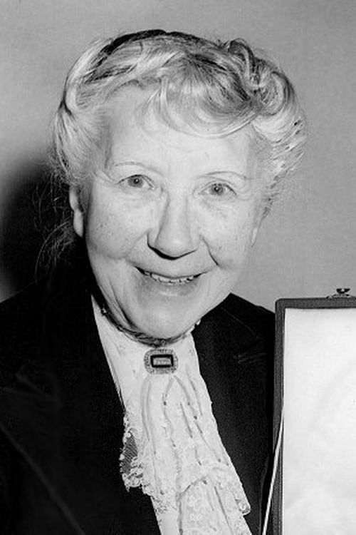 Katie Johnson as Miss Sarita Dunlop