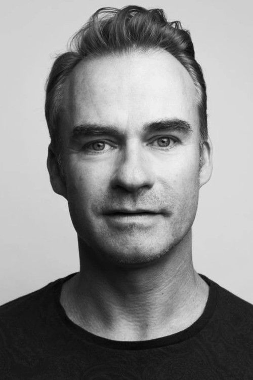 Jonathan Keane as JONNY