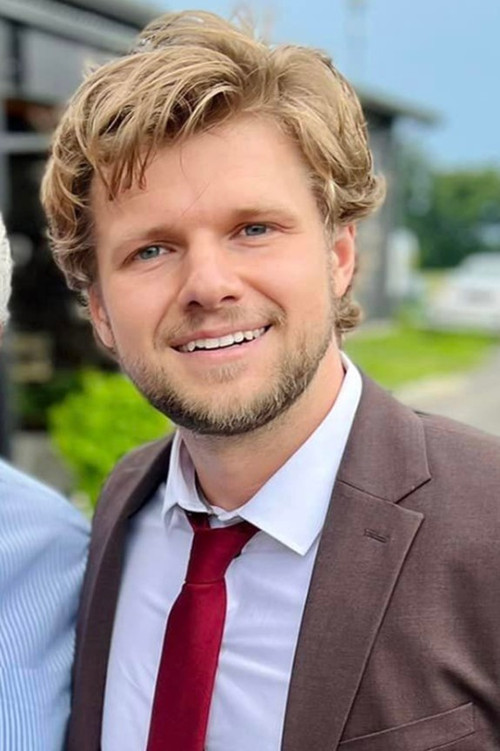 Joshua Triezenberg as Mob Boss (uncredited)