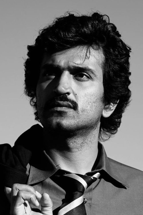 Dinker Sharma as SI Vijay Solanki