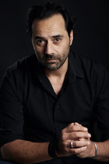 Alex Klaus as Prison Barber