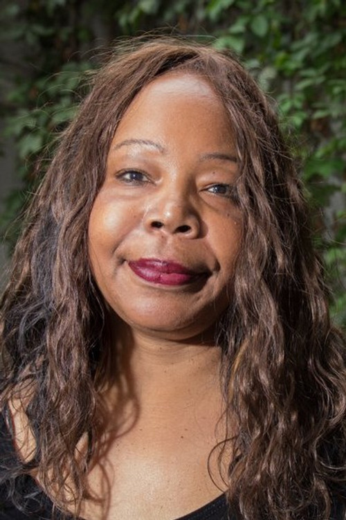 Néfertari Bélizaire as Self (archive footage) (uncredited)