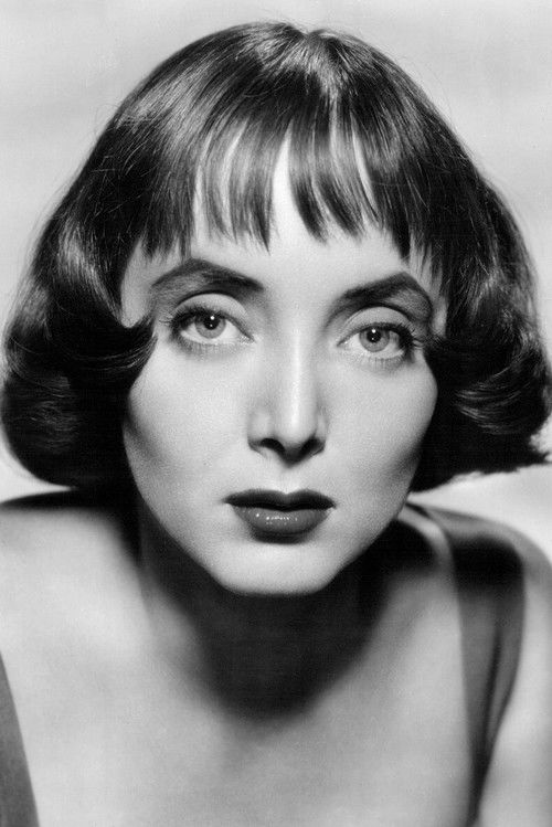 Carolyn Jones as Morticia Addams/Ophelia Frump