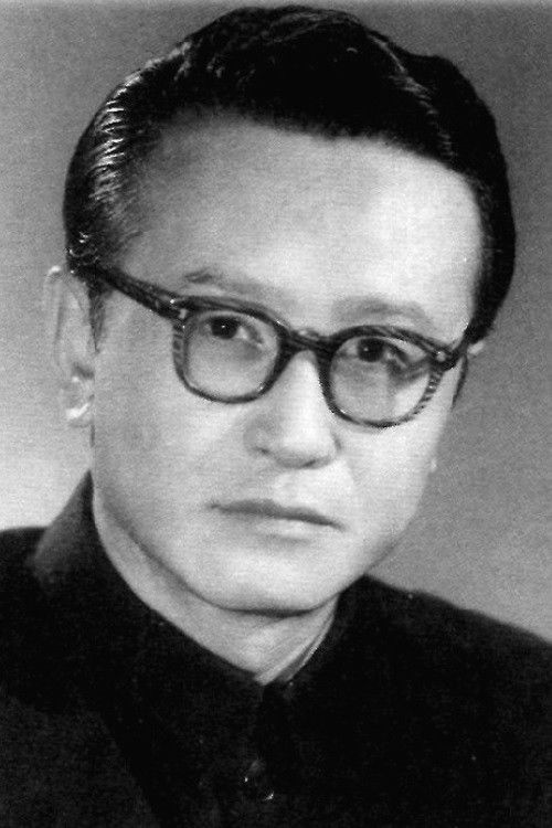 Yiqing Yin as Teacher Fang