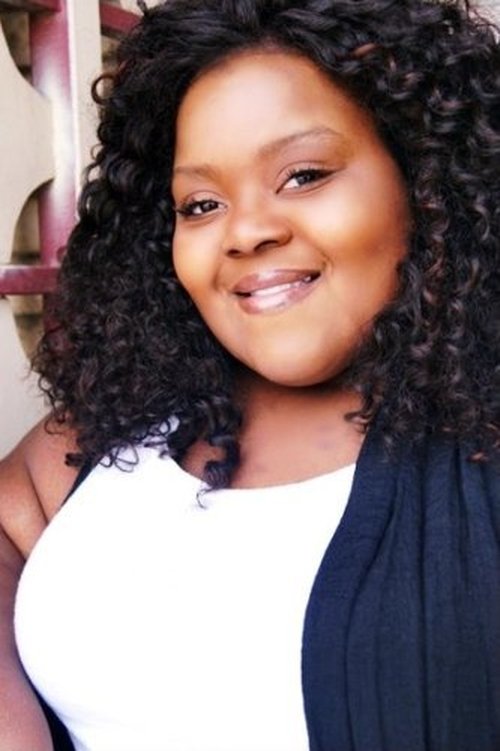 Evie Pree as TV Woman Voice #1